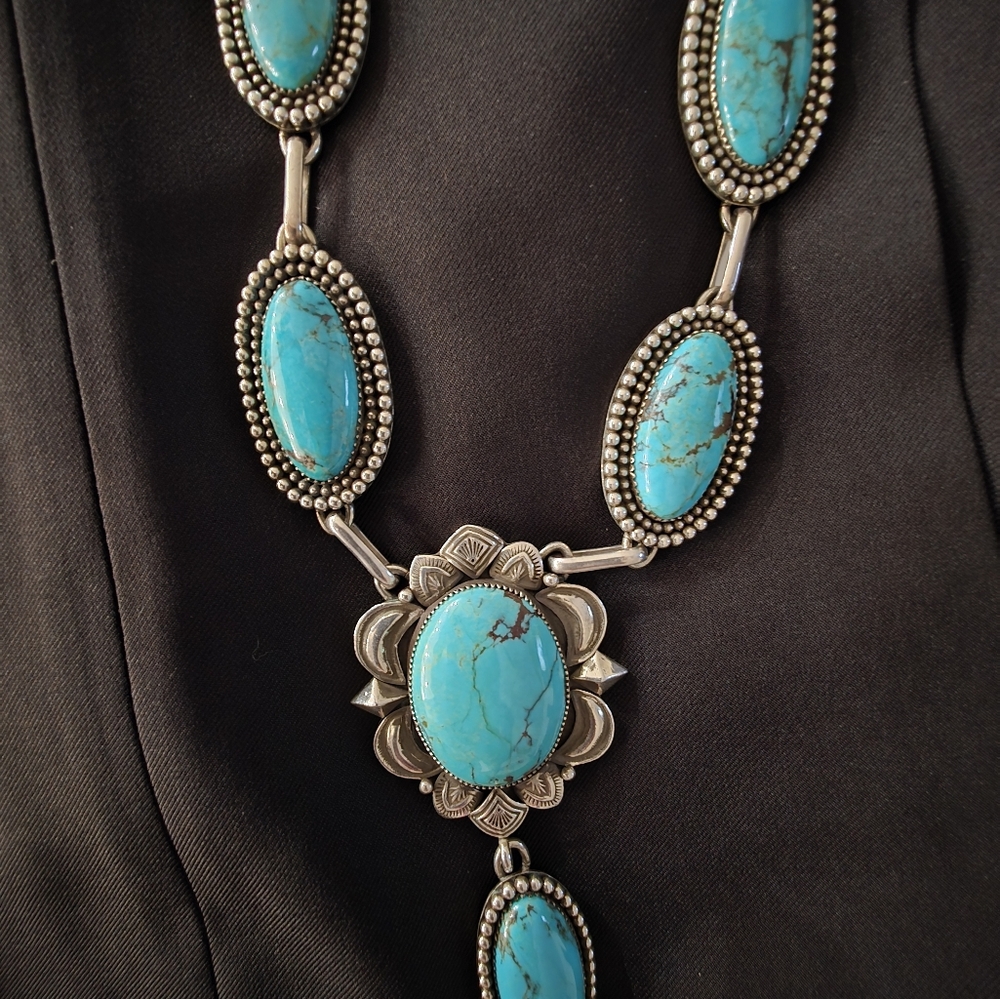 Blue and Silver Ornate Necklace with Intricate Metalwork